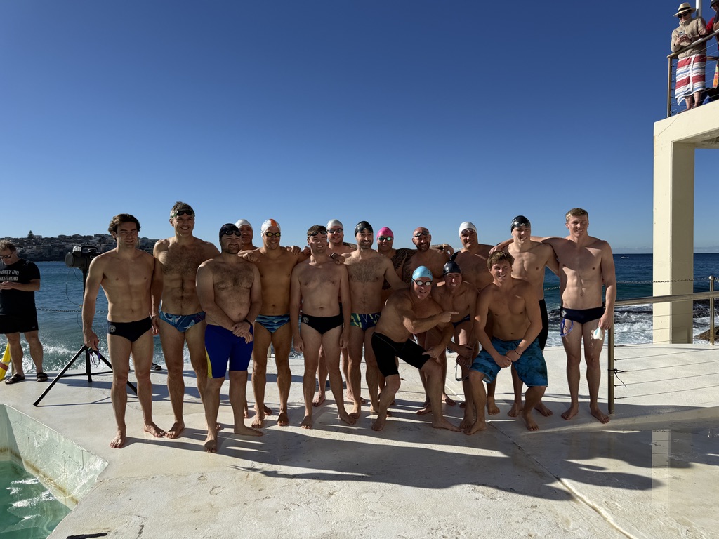 Winter swimmers lined up on the Bondi Icebergs pool deck