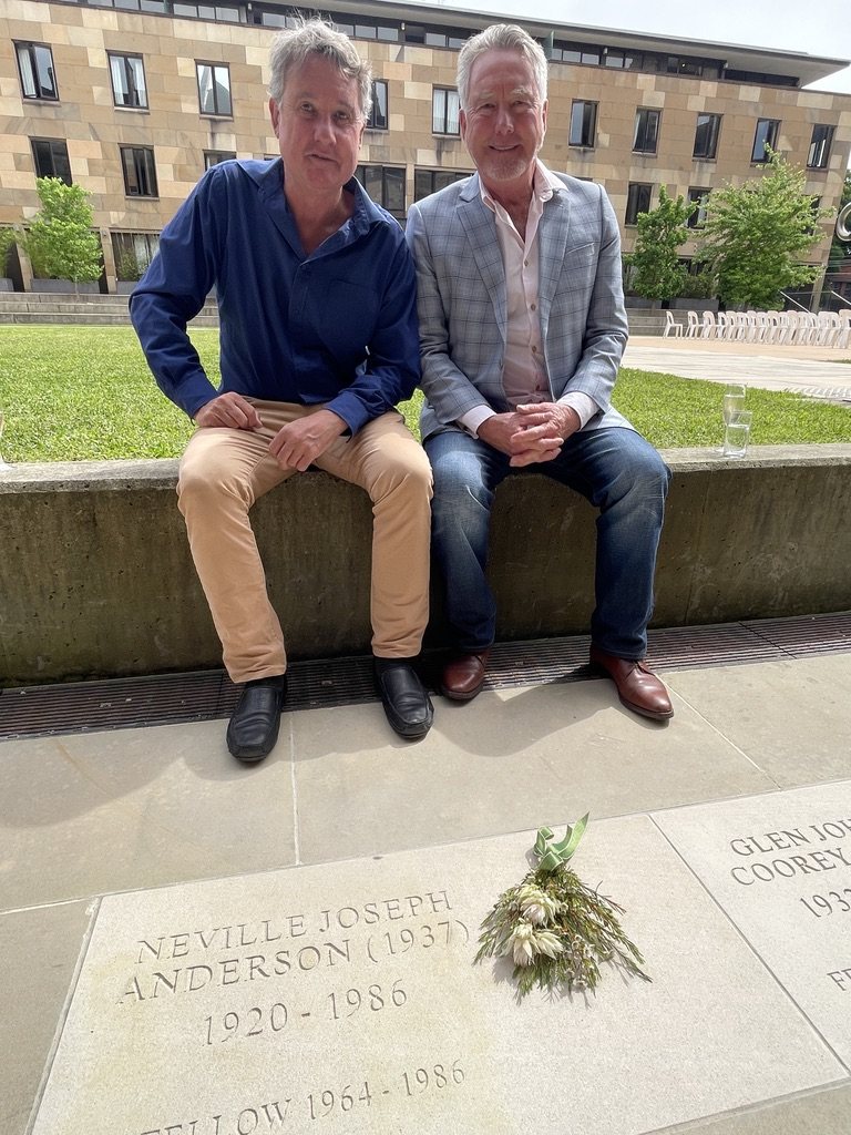 Neville Anderson’s engraved stone at St John’s College, a posy of flowers beside it