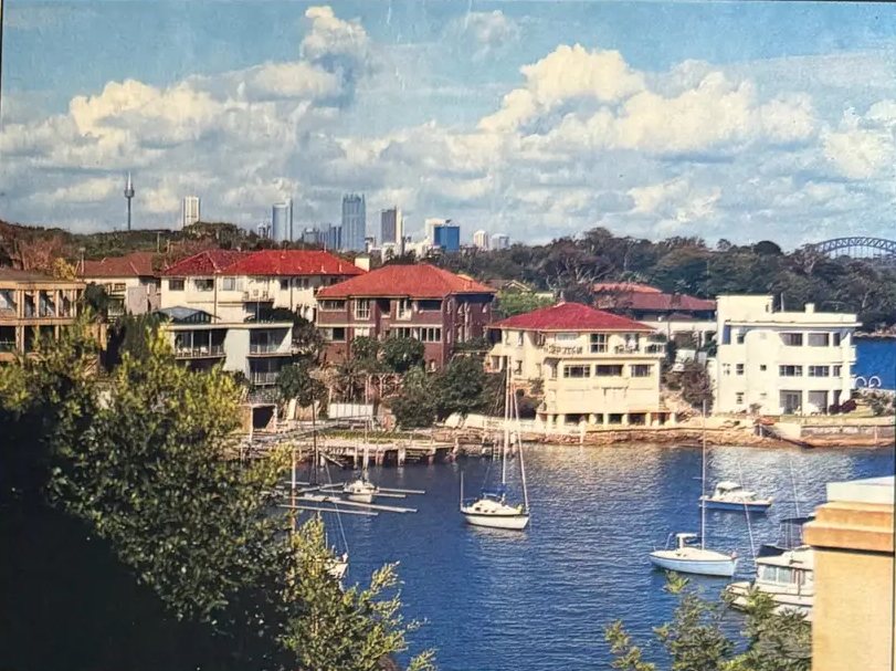 View across Parsley Bay to the city skyline and the Harbour Bridge from 5/28 The Crescent, Vaucluse