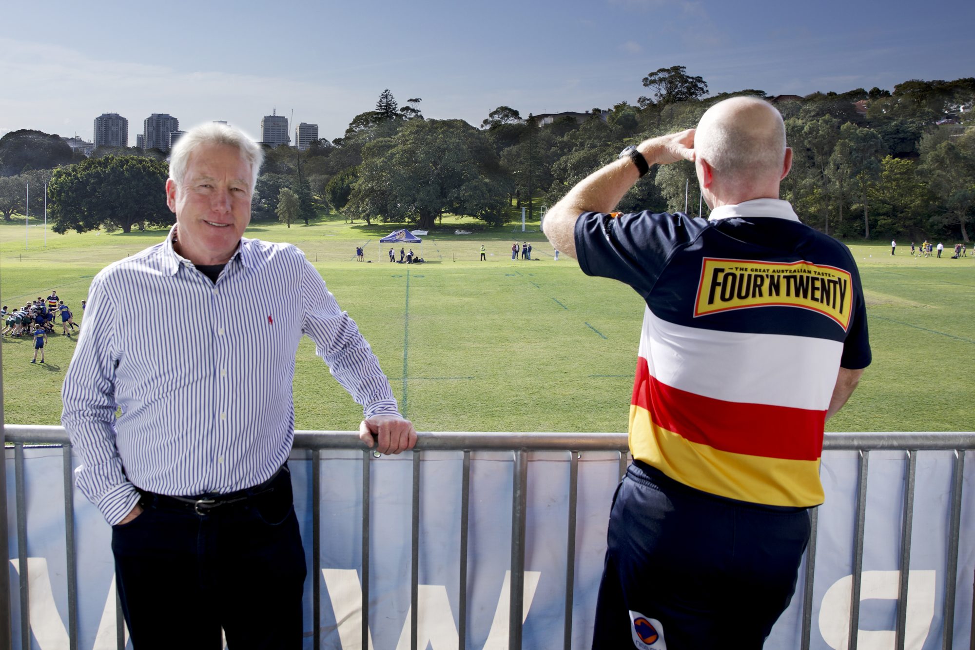Peter Anderson at the railing of the pavilion overlooking the Queens Park playing fields